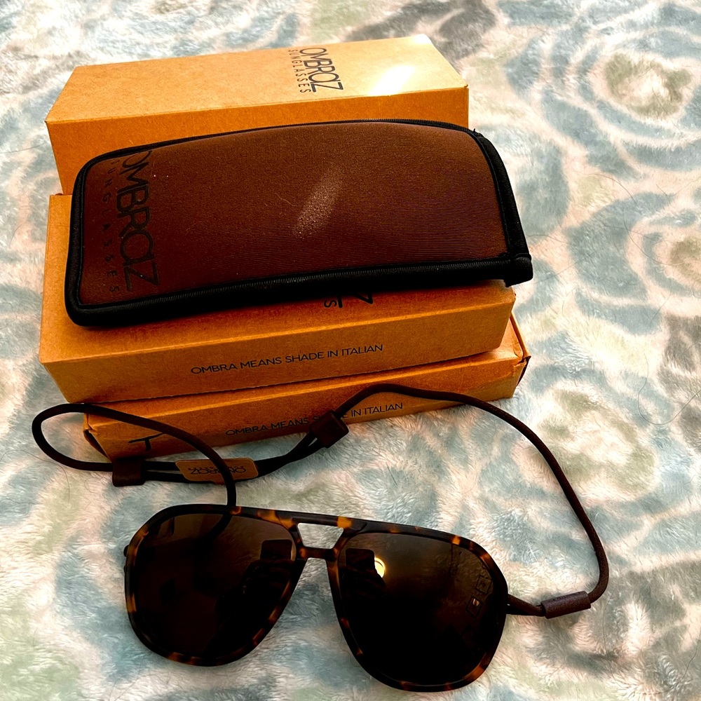 Ombraz sunglasses. I have three pairs in stock.